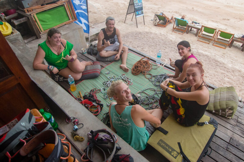a group of people sitting on a floor
