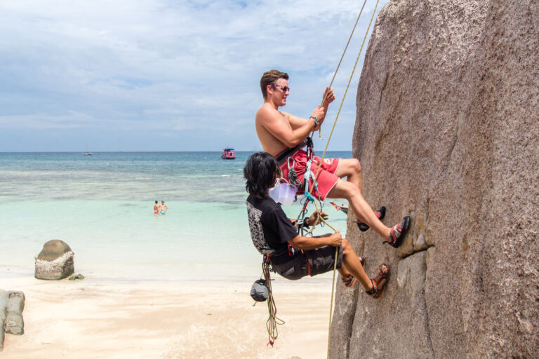 Rock Climbing in Koh Tao. Two Rock Climbers doing the Rescue Climbing Course